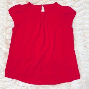 Red pepper tulip sleeve dress top with keyhole back.